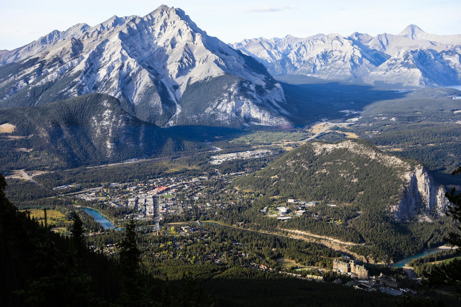 The town of Banff, the Bow River and Tunnel Mountain below Cascade Mountain, seen from high on Sulphur Mountain